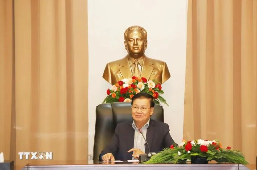 Tổng Bí thư, Chủ tịch nước Lào Thongloun Sisoulith tiếp Đoàn quân tình nguyện và chuyên gia quân sự Việt Nam. Ảnh: Xuân Tú/TTXVN Tổng Bí thư