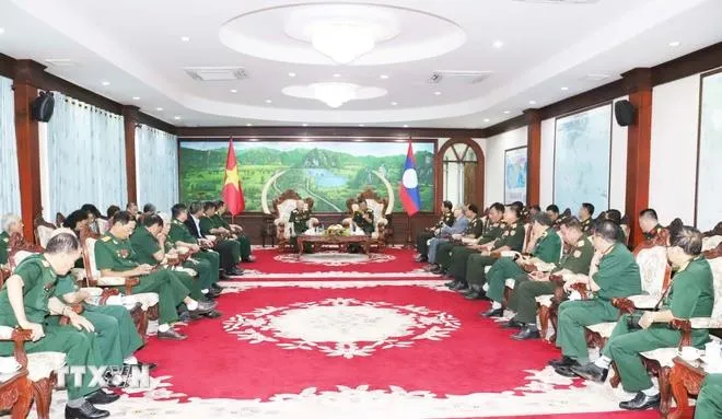 Quang cảnh Phó Thủ tướng, Bộ trưởng Quốc phòng Lào Chansamone Chanyalath tiếp Đoàn. Ảnh: Xuân Tú/TTXVN tong-bi-thu-lao-quan-tinh-nguyen-3.webp