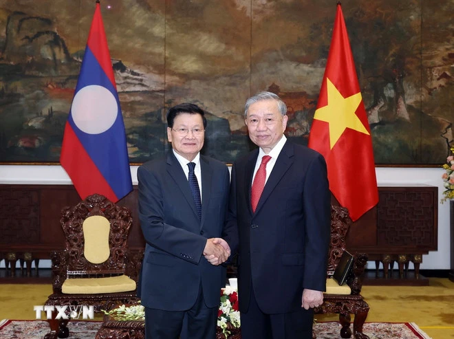 Tổng Bí thư Tô Lâm hội kiến Tổng Bí thư, Chủ tịch nước Lào Thongloun Sisoulith. Ảnh: TTTXVN Tổng Bí thư Tô Lâm