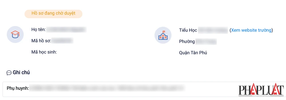 Kiểm tra tình trạng hồ sơ đăng ký nhập học trực tuyến lớp 1 cho trẻ. Ảnh: MINH HOÀNG