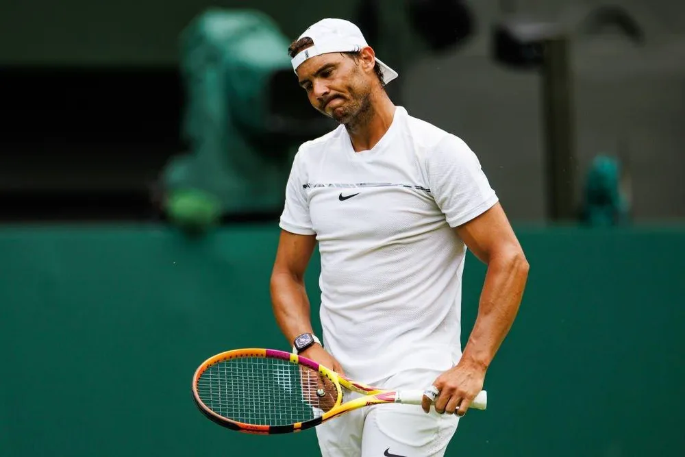 Nadal tỏ vẻ không hài lòng sau trận đấu tập với Tiafoe. Ảnh: GETTY