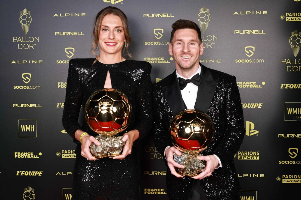 Alexia Putellas và Leonel Messi cùng đoạt danh hiệu Quả bóng vàng. Ảnh: GETTY