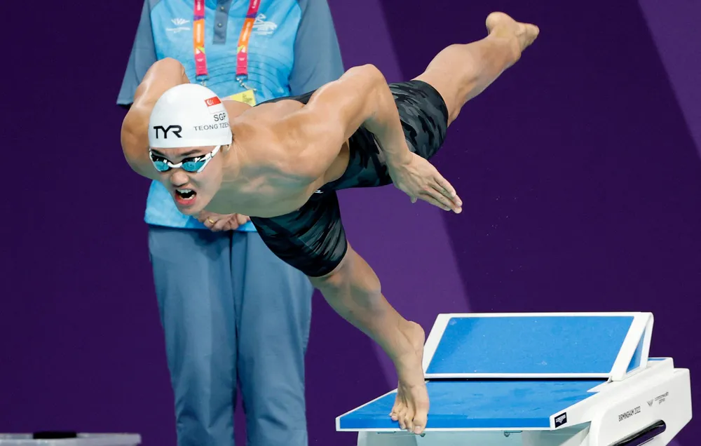 Teong Tzen Wei thi đấu chung kết cự ly 50 m bướm tại Đại hội thể thao Khối thịnh vượng chung. Ảnh: REUTERS