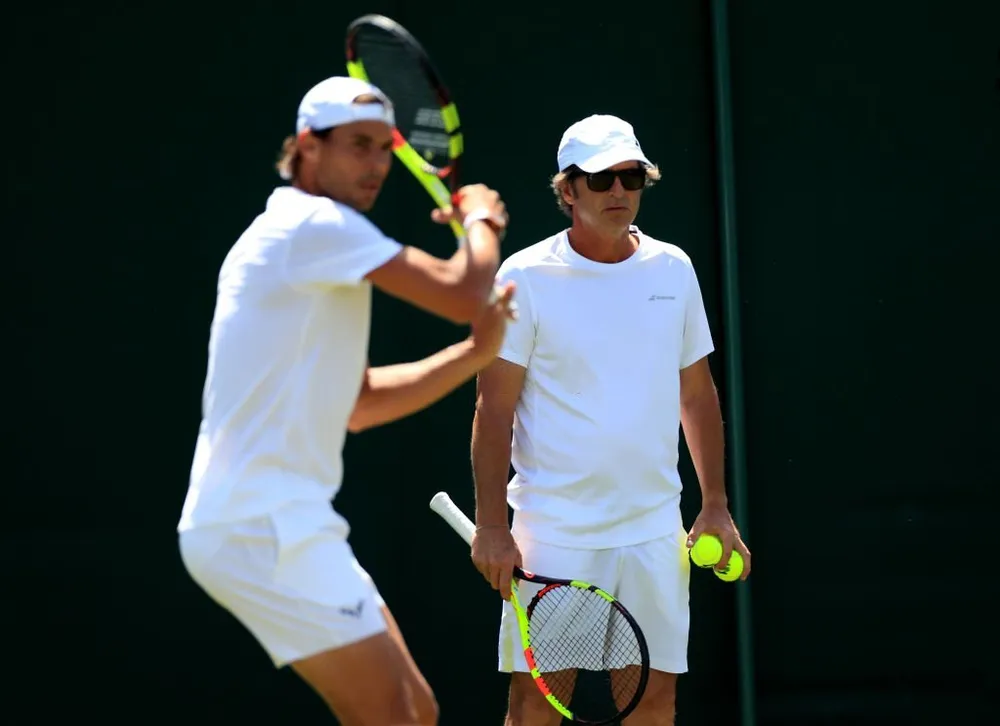 Rafael Nadal thời còn tập luyện dưới sự hướng dẫn của chú Toni. Ảnh: GETTY