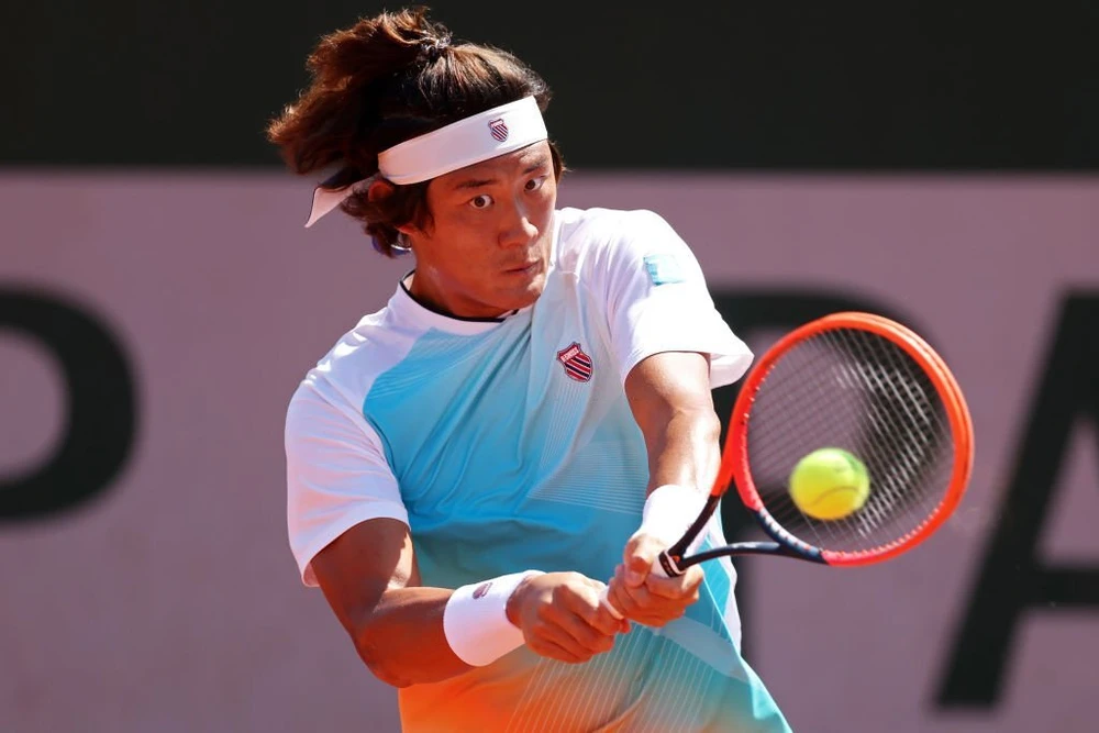 Zhang Zhizhen trở thành tay vợt nam Trung Quốc đầu tiên sau 86 năm lọt đến vòng 3 giải Pháp mở rộng. Ảnh: GETTY