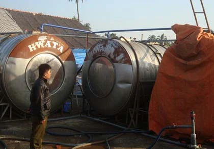 Vào bồn chứa dịch tôm, 3 người trong gia đình chết ngạt ảnh 1