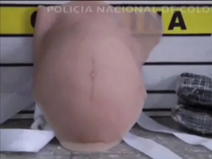 Giấu 2 kg ma túy trong bụng bầu giả ảnh 3 Giấu 2 kg ma túy trong bụng bầu giả ảnh 3