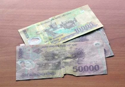 Đổi tiền rách, hỏng không mất phí ảnh 1