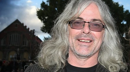 Nhà toán học kiếm hàng tỉ USD nhờ thắng bạc ảnh 1