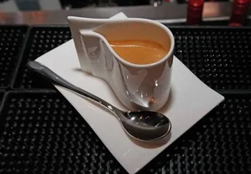 100 USD một tách cà phê chồn ảnh 1