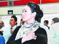 Củng Lợi tại buổi lễ tuyên thệ trở thành công dân Singapore - Ảnh: Lianhe Wanbao.