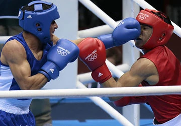 Olympic London 2012: Nhà vô địch dưới làn bom đạn ảnh 1