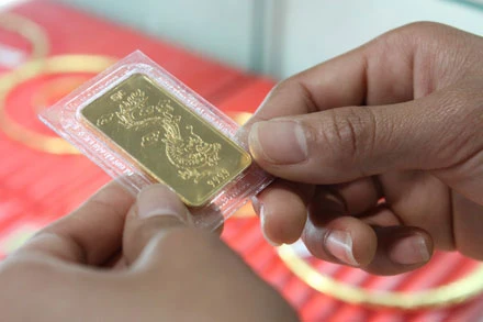 Giá vàng "hạ nhiệt" ảnh 1