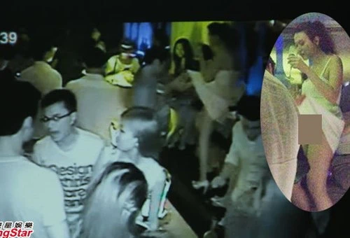 Siêu mẫu Hong Kong bị đàn ông tốc váy trong hộp đêm ảnh 1