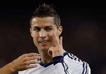 Giải mã bí ẩn đằng sau kiểu tóc mới của C.Ronaldo ảnh 1