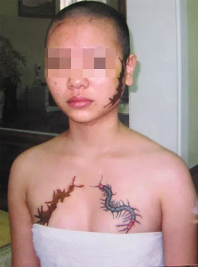 Bà chủ ép osin xăm quái thú lên mặt bị bắt ảnh 1 Bà chủ ép osin xăm quái thú lên mặt bị bắt ảnh 1