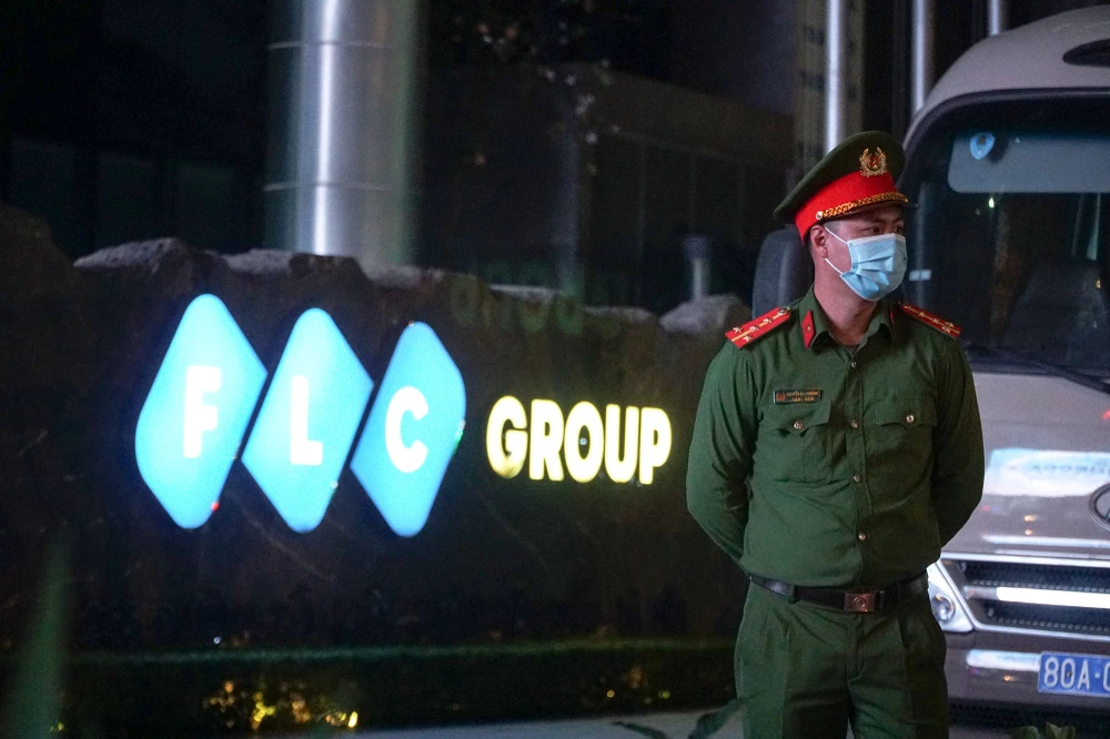Chùm ảnh: Gần 7 tiếng khám xét trụ sở Tập đoàn FLC ở TP Hà Nội ảnh 4