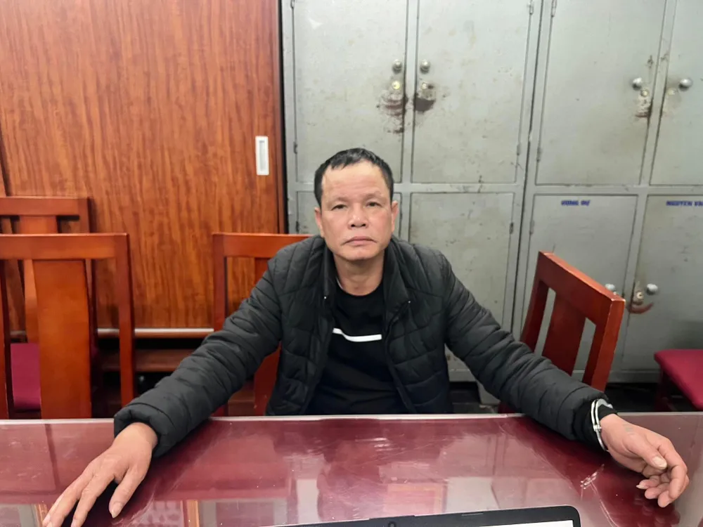 Phạm Văn Thắng tại cơ quan công an. Ảnh CACC