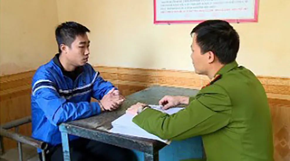 Nguyễn Văn Long tại cơ quan công an. Ảnh: CACC