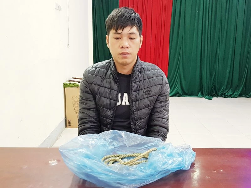 Nông Văn Tuấn tại cơ quan công an. Ảnh CACC