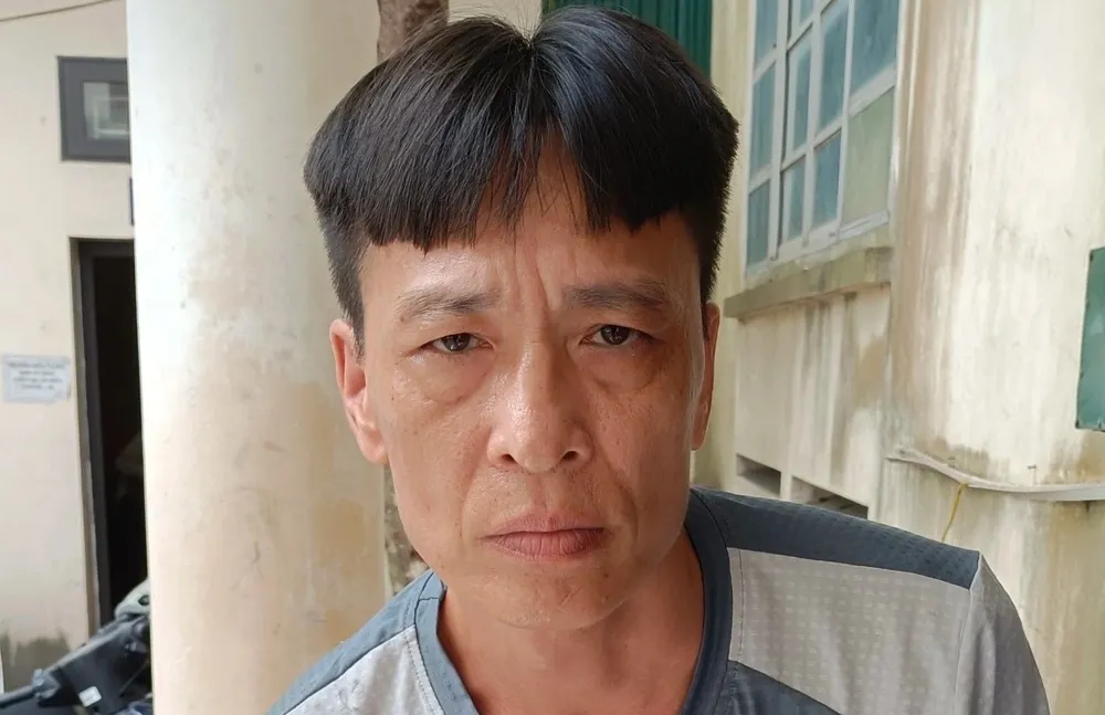 Phạm Hồng Việt bị bắt giữ. Ảnh: CACC Chân dung Phạm Hồng Việt