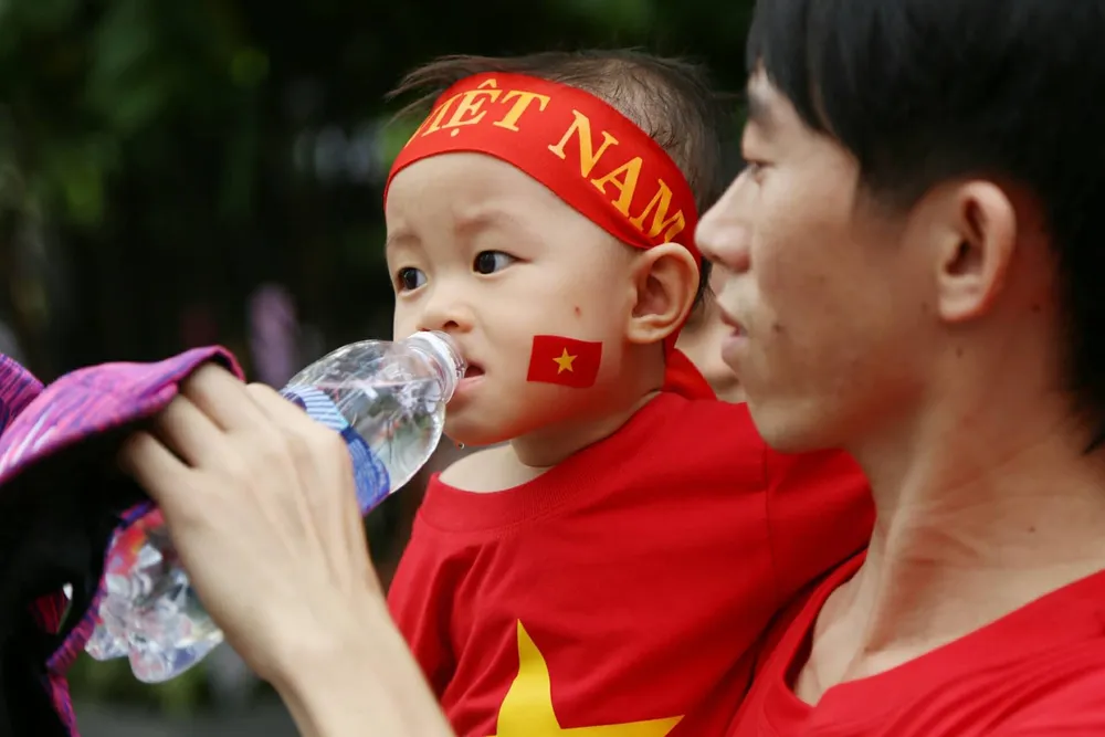 Cổ động viên cả nước tiếp lửa cho Olympic Việt Nam ảnh 14