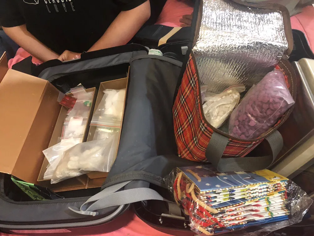 Nhóm buôn ma túy thủ súng, thuê chung cư để giao dịch ở TP.HCM ảnh 4 Nhóm buôn ma túy thủ súng, thuê chung cư để giao dịch ở TP.HCM ảnh 4