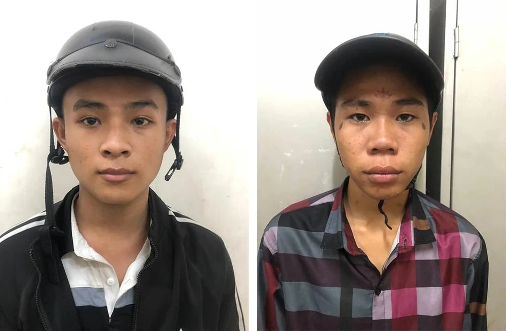 Khá và Huy tại cơ quan điều tra. Ảnh: CA