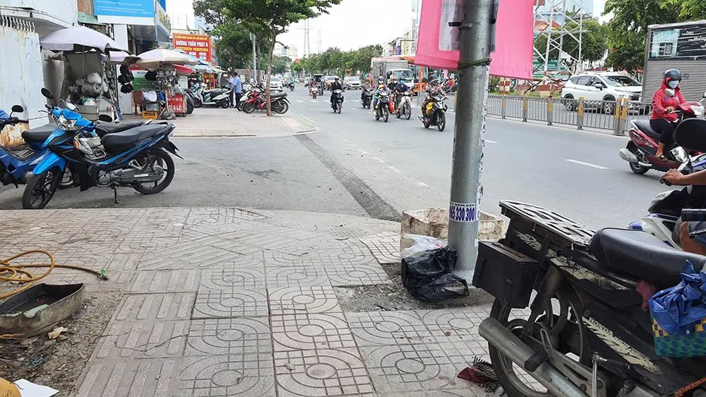 Khu vực xảy ra vụ việc trên đường Kinh Dương Vương. Ảnh: HT Khu vực xảy ra vụ việc trên đường Kinh Dương Vương. Ảnh: HT