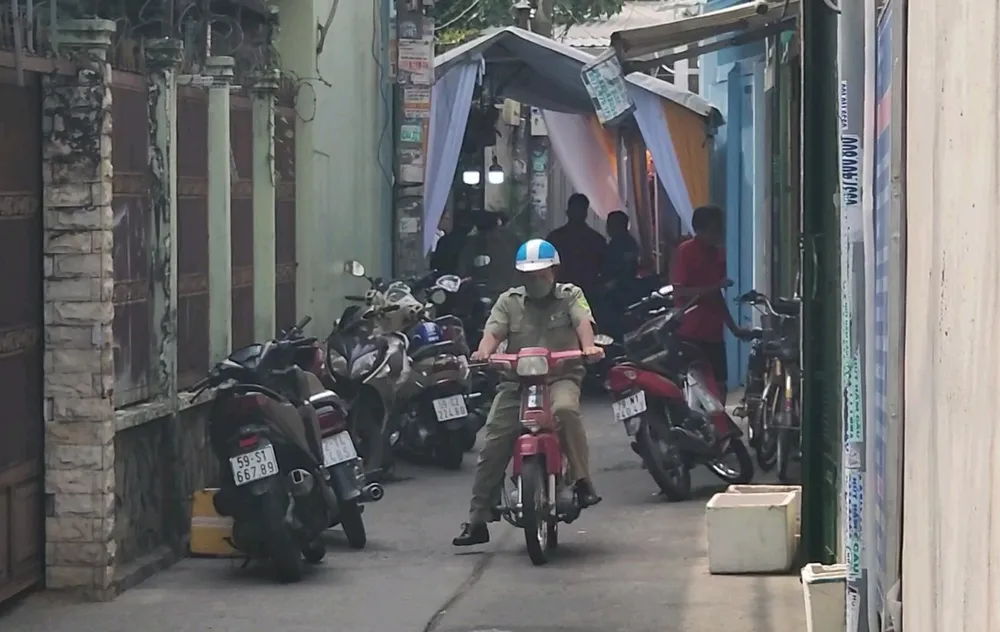 Vụ việc xảy ra tại con hẻm trên đường ĐHT08 khiến hai người tử vong. Ảnh: HT