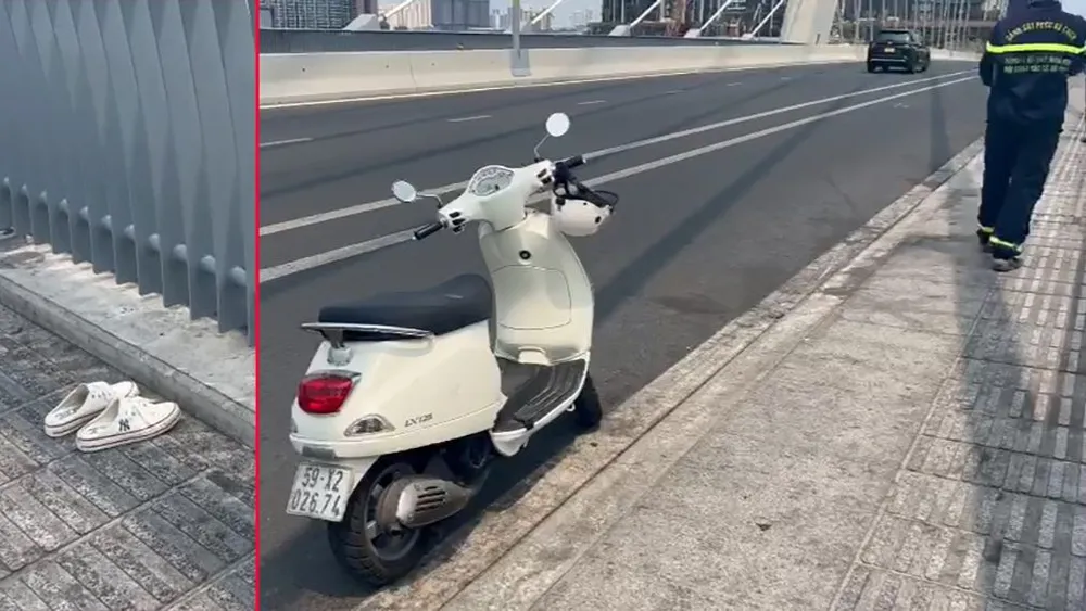 Cô gái để lại chiếc xe máy và đôi giày trên cầu. Ảnh: HT Cô gái để lại chiếc xe máy và đôi giày trên cầu. Ảnh: HT