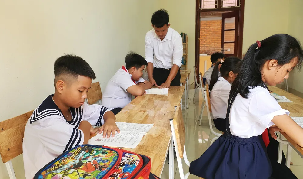 Theo Bộ GD&ĐT, các trường không dùng kết quả học ngoại ngữ của học sinh lớp 1, 2 để xét lên lớp. Ảnh: PLO Theo Bộ GD&ĐT, các trường không dùng kết quả học ngoại ngữ của học sinh lớp 1, 2 để xét lên lớp. Ảnh: PLO