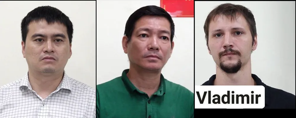 Hải, Triển và Verevkin Vladimir tại cơ quan điều tra. Ảnh: CA