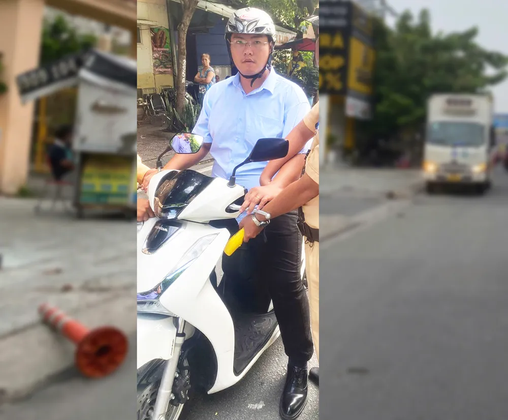 Công an đã khởi tố, tạm giam với Tuấn về hành vi sau khi kéo lê một CSGT 7 mét trên đường. Ảnh: CA Bị đo nồng độ cồn, thanh niên lái xe bỏ chạy kéo lê một CSGT 7 mét