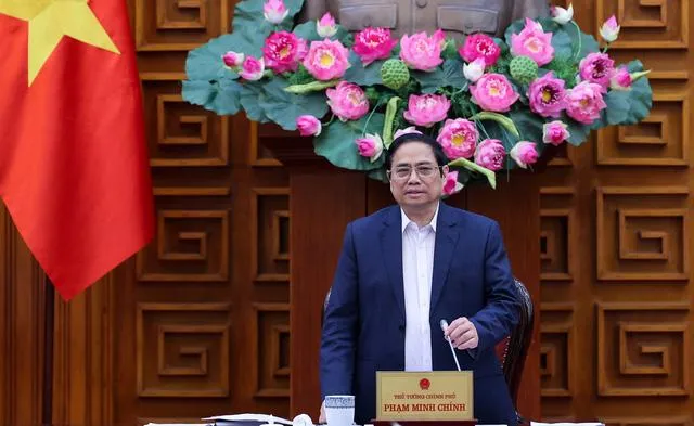 Thủ tướng Phạm Minh Chính tại buổi làm việc chiều 21-4. Ảnh: VGP/NHẬT BẮC