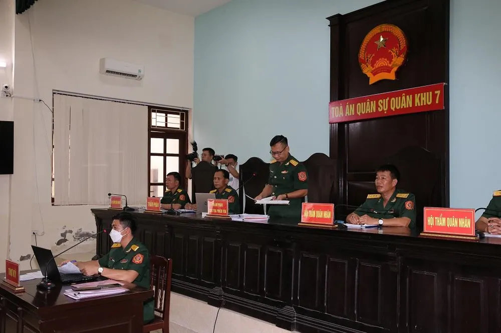 Phiên tòa sáng 12-7. Ảnh: Thông tấn Quân sự Phiên tòa sáng 12-7. Ảnh: Thông tấn Quân sự