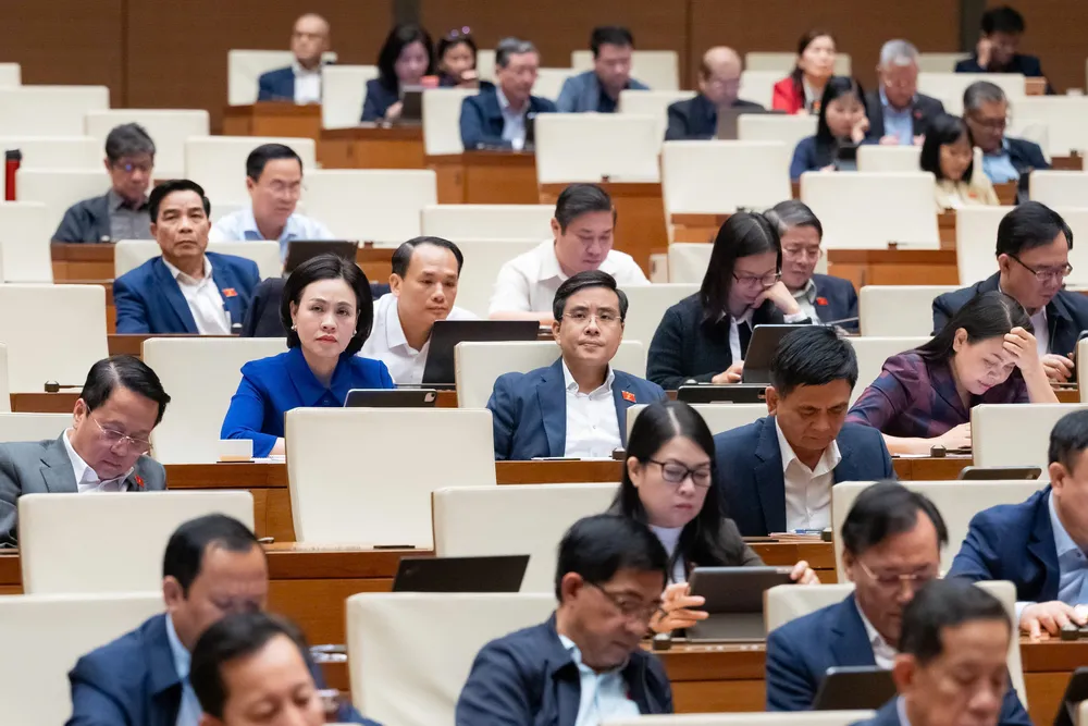 Các đại biểu Quốc hội tham gia phiên thảo luận về dự thảo Luật Tòa án chuyên biệt tại Trung tâm tài chính quốc tế hôm 5-12. Ảnh: QH