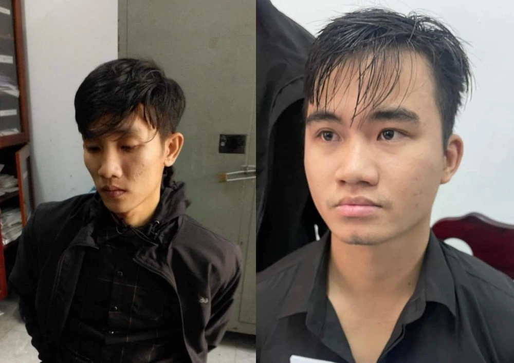 Trí và Cường (bên trái) tại cơ quan công an. Ảnh: CA cuop-ngan-hang-hai-doi-tuong.jpg