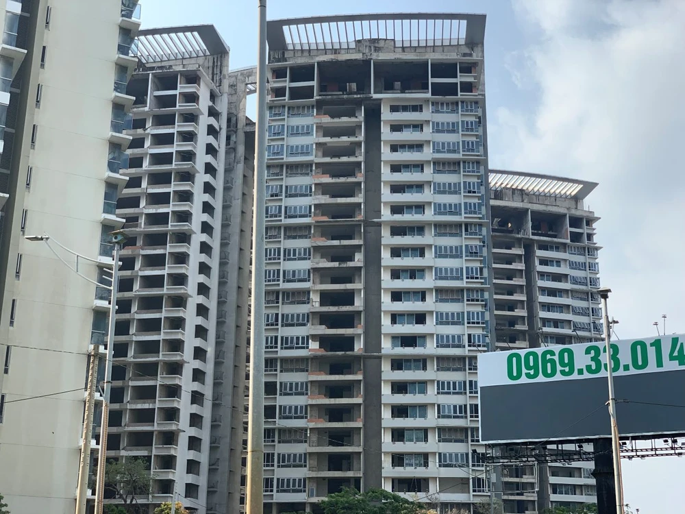 Các luật liên quan đến thị trường bất động sản sắp có hiệu lực sẽ giúp tháo gỡ khó khăn và hỗ trợ cho các doanh nghiệp. Ảnh: PHƯƠNG MINH bất động sản.jpg