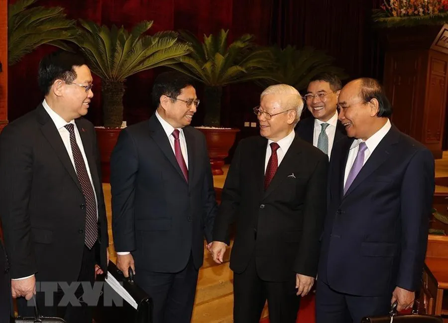 Tổng Bí thư Nguyễn Phú Trọng, Chủ tịch nước Nguyễn Xuân Phúc, Thủ tướng Phạm Minh Chính và Chủ tịch Quốc hội Vương Đình Huệ dự bế mạc Hội nghị. Ảnh: TTXVN