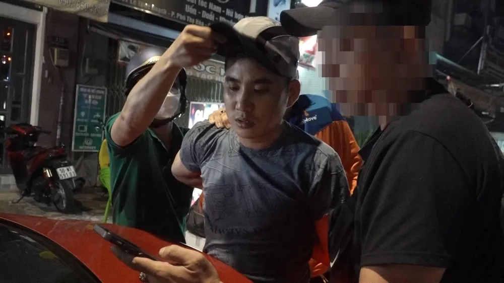 Trần Văn Hoài bị công an bắt giữ. Ảnh: HT