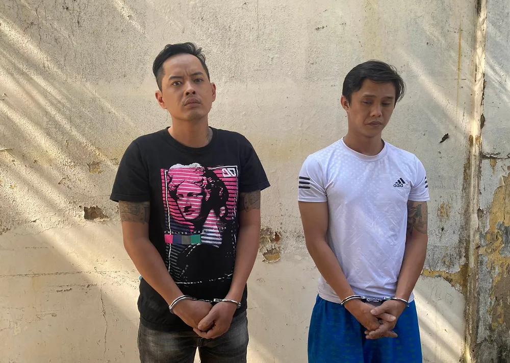 Trương Minh Thiện và Trương Vĩnh Xương bị công an bắt giữ. Ảnh: ĐC