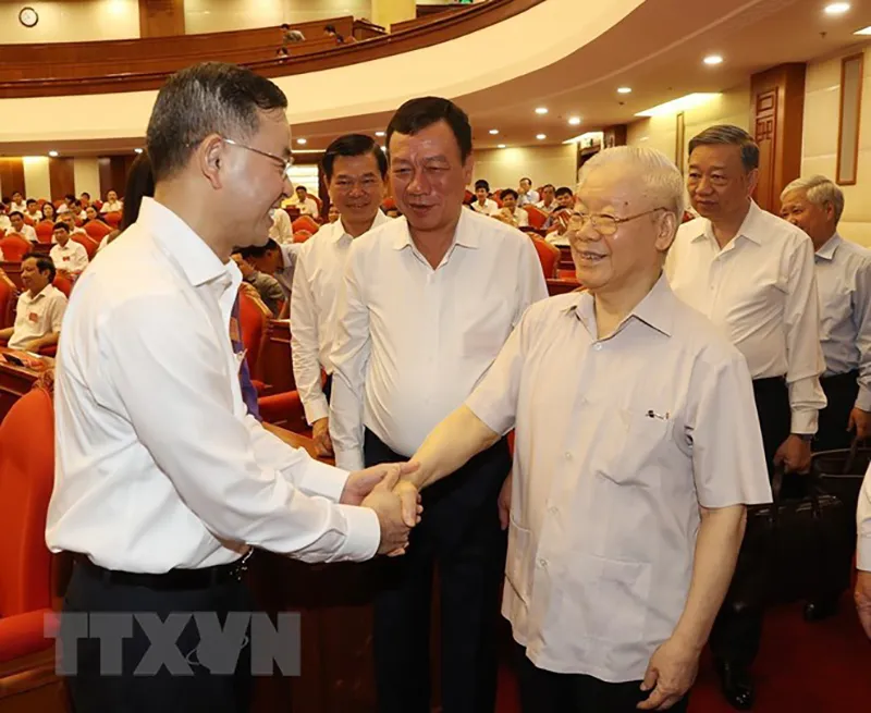 Tổng Bí thư Nguyễn Phú Trọng cùng các đại biểu tham dự hội nghị. Ảnh: TTXVN