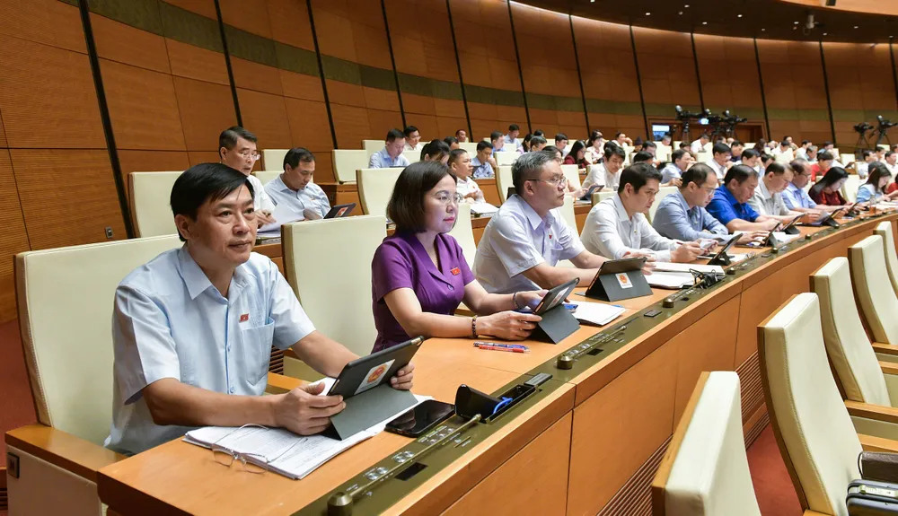 Các đại biểu tại phiên thảo luận về dự án xây dựng đường cao tốc Gia Nghĩa - Chơn Thành. Ảnh: PHẠM THẮNG Cao tốc Gia Nghĩa - Chơn Thành: Băn khoăn việc thu hồi vốn khi nhiều nhất chỉ 60 xe đi qua mỗi ngày