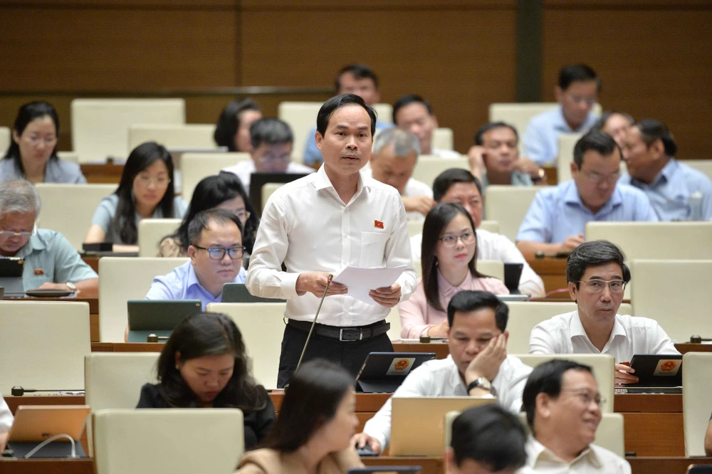 Đại biểu Nguyễn Duy Minh (đoàn Đà Nẵng). Ảnh: PHẠM THẮNG de-xuat-khong-quy-dinh-cung-ti-le-phan-phoi-2-kinh-phi-cong-doan-duy-minh.jpeg