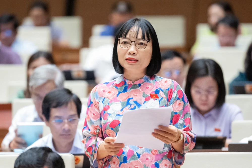 Đại biểu Nguyễn Thị Việt Nga (đoàn Hải Dương). Ảnh: PHẠM THẮNG de-xuat-khong-quy-dinh-cung-ti-le-phan-phoi-2-kinh-phi-cong-doan-viet-nga.jpeg