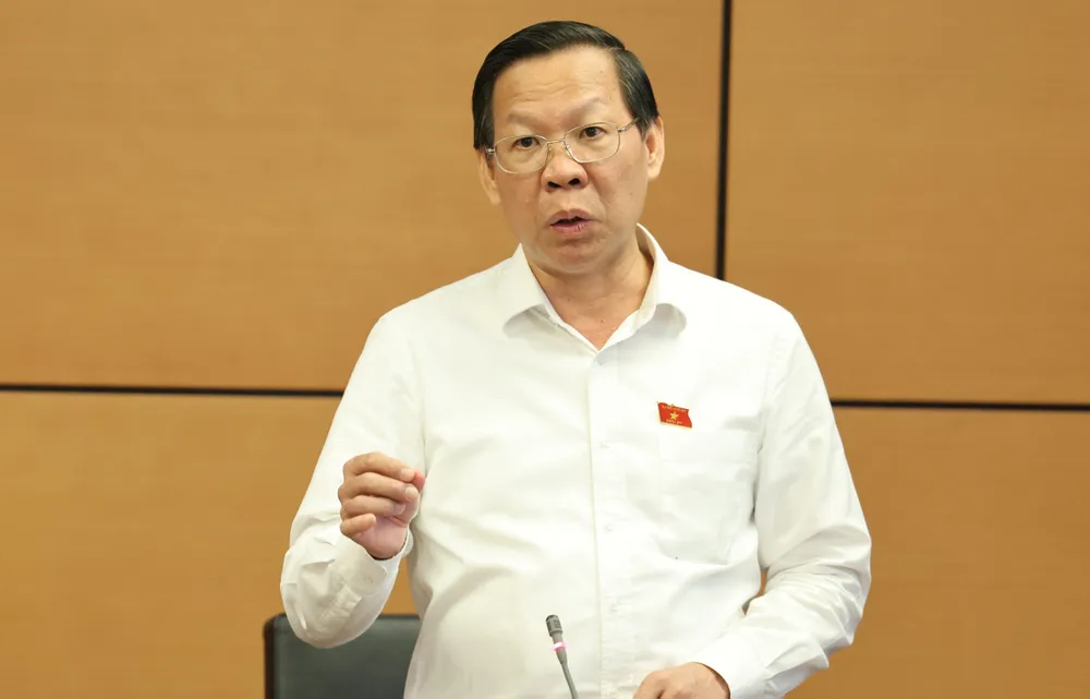 Chủ tịch UBND TP.HCM Phan Văn Mãi nêu ý kiến tại phiên thảo luận tổ. Ảnh: QP Chủ tịch TP.HCM Phan Văn Mãi: Sẽ có 'TP trong làng, làng trong TP'