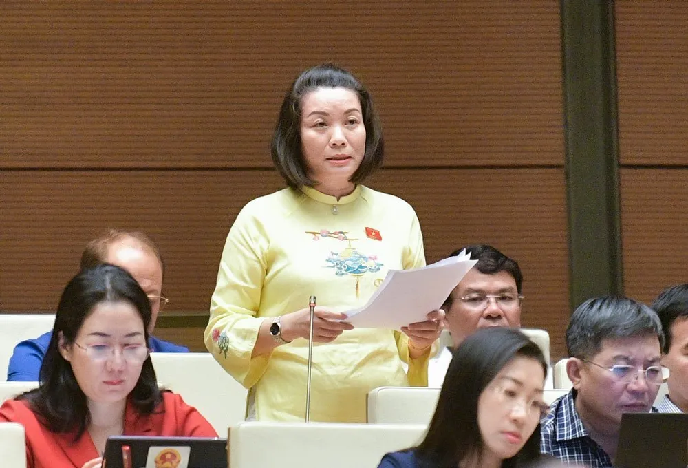 Đại biểu Nguyễn Minh Tâm (đoàn Quảng Bình). Ảnh: PHẠM THẮNG Tranh luận việc tách riêng án người lớn và trẻ vị thành niên tách vụ án hình sự