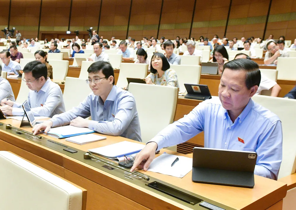 Quốc hội điều chỉnh chương trình họp, bàn công tác nhân sự, cải cách tiền lương. Ảnh: PHẠM THẮNG Quốc hội điều chỉnh chương trình họp, bàn công tác nhân sự, cải cách tiền lương