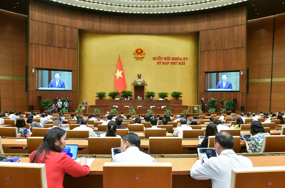 Các đại biểu Quốc hội tham dự phiên họp sáng 27-6. Ảnh: PHẠM THẮNG quoc-hoi-khong-dong-y-bo-sung-duong-toc-do-cao-vao-luat-duong-bo.jpg